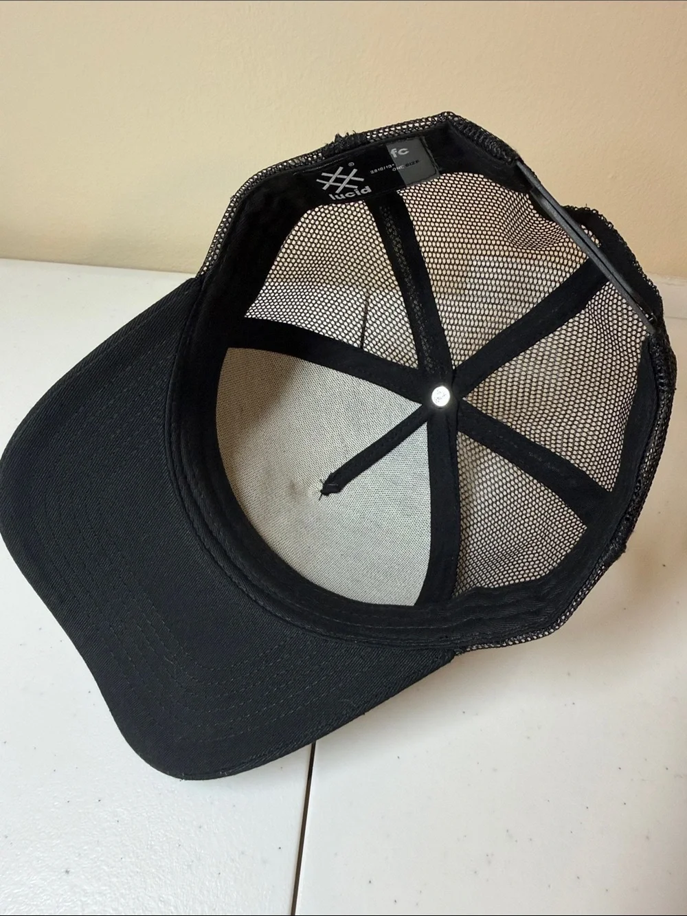 Lucid FC Black Trucker Hat with Silver Embroidered Geometric Logo, Rihanna style